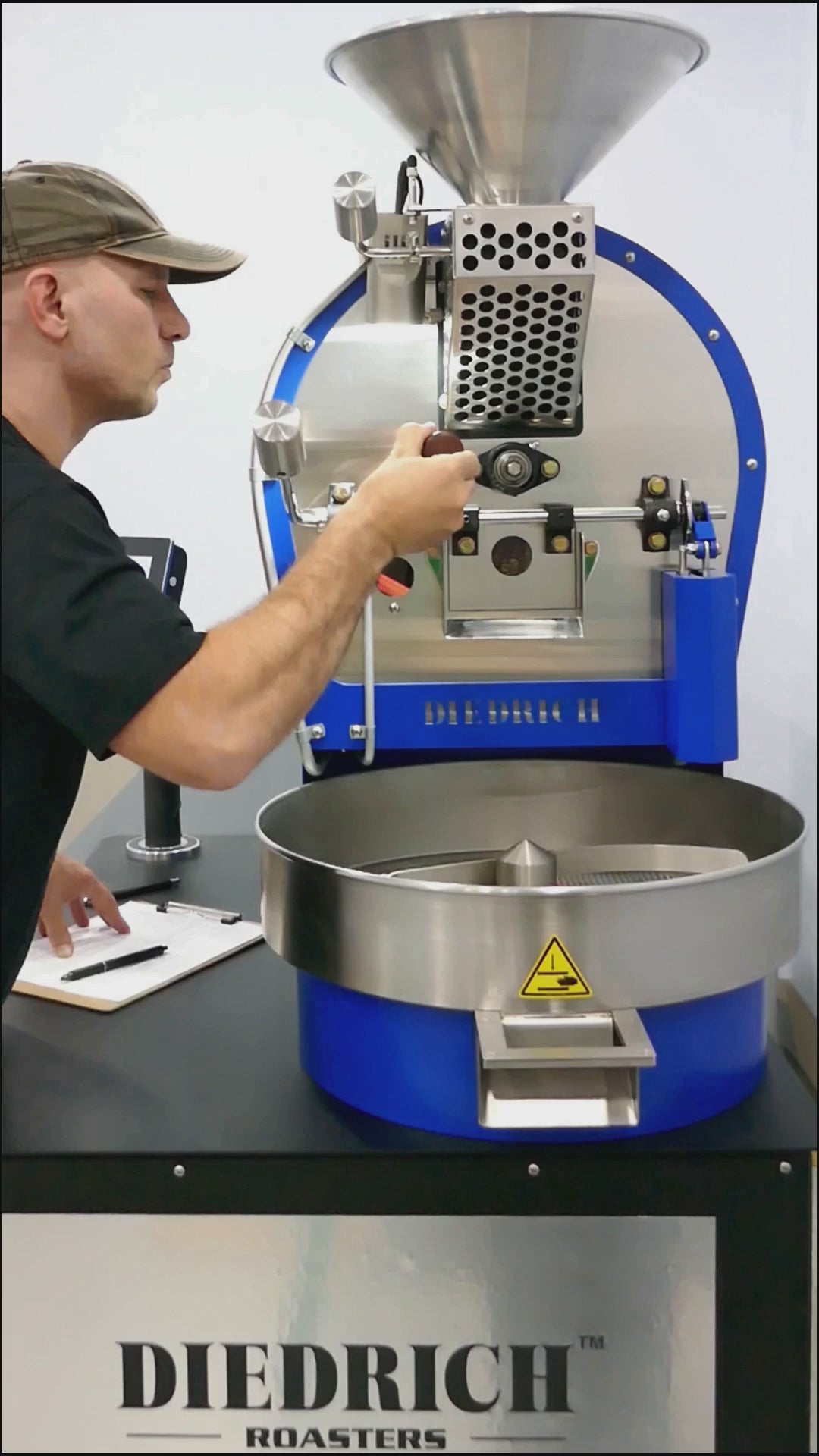 Load video: Our new 3 kilo Diedrich roaster, dropping a fresh batch of an 87 Point Naturally Processed Colombian Coffee.